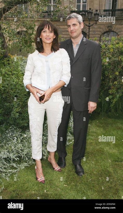 "French actress Sophie Marceau and husband producer Jim Lemley pose