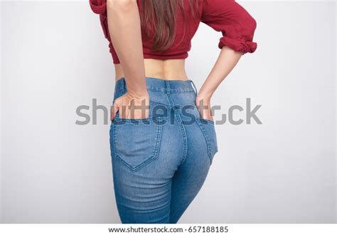 Juicy Big Ass Girl In Tight Jeans Sports Figure A Healthy Way Of Life White Background