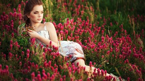 Download Lying Down Dress Brunette Field Flower Woman Mood Hd Wallpaper