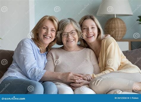 Elderly Granny Mature Daughter Millennial Granddaughter Smile Pose For Camera Stock Photo