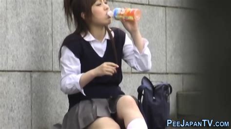 Japanese Babe Rubs Cunt