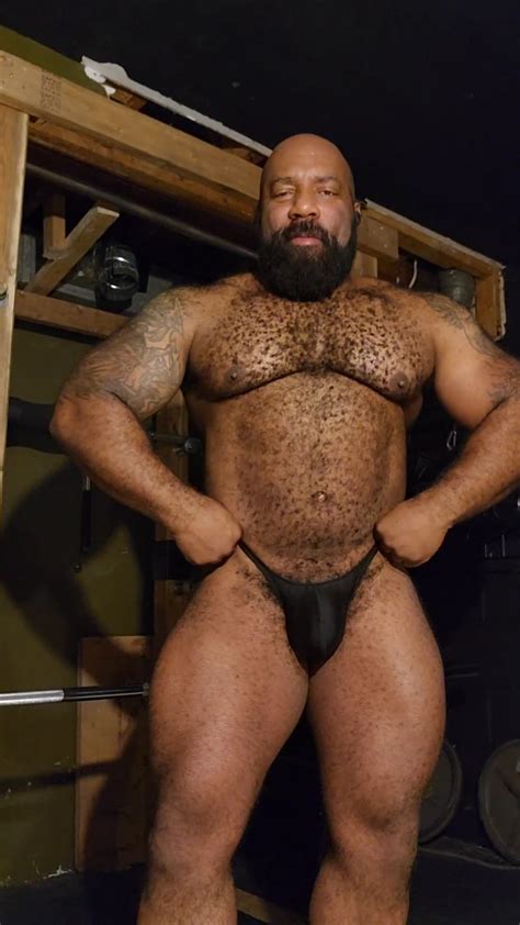 HOT HAIRY MUSCLE DADDY POSING IN BLACK THONG ThisVid