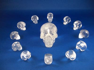 13 CRYSTAL SKULLS