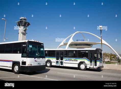 Two Buses Against Blue Sky Lax Los Angeles International Airport