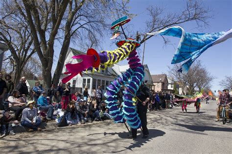 Photos: May Day revelers parade through the heart of Mpls. | Minnesota Public Radio News