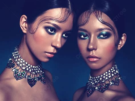 Fashion Studio Portrait Of Two Twins Beautiful Asian Women With Diamond ...