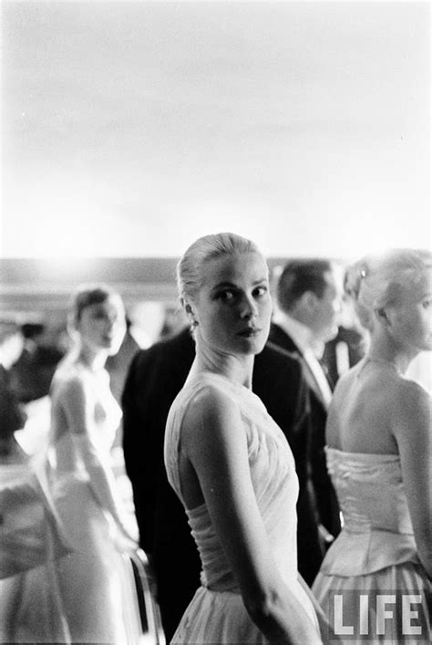 Audrey Hepburn and Grace Kelly backstage at the 28th Annual Academy ...