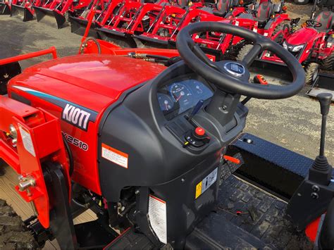 Kioti CX2510 Tractor w/ Loader & Forks & PJ 7x18 C4 Trailer