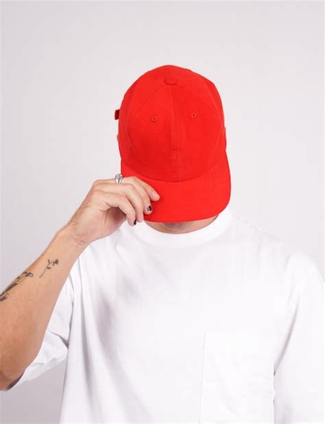 Premium Photo A Man Wearing A Red Hat