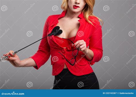 Dominant Blonde Woman In Red Biting Lips Stock Image Image Of Dominatrix Glamour 233743387
