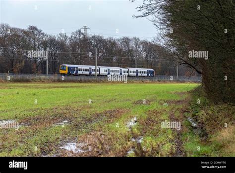 Class 323 Electric Multiple Unit Of Northern Rail Seen At Winwick On The West Coast Main Stock