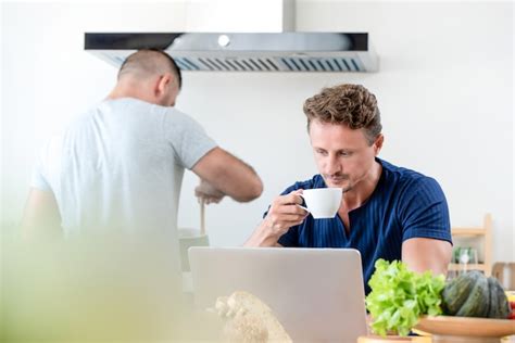 Premium Photo Male Caucasian Gay Couple Doing Daily Morning Routines At Home
