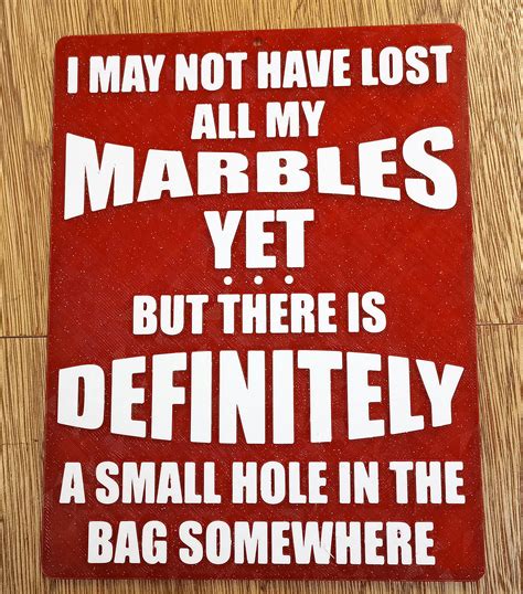 Funny Sign I May Not Have Lost All My Marbles Yet By Spudd78