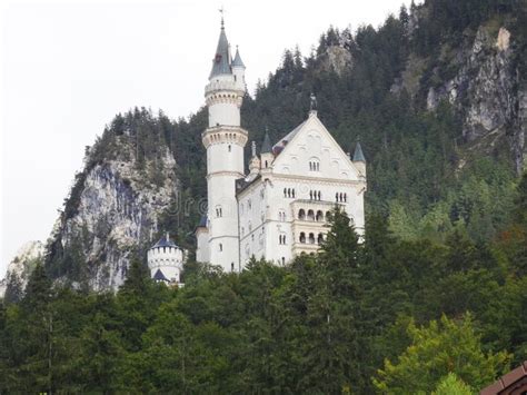 Neuschwanstein Castle Nestled Beautifully In The Foothills Of The