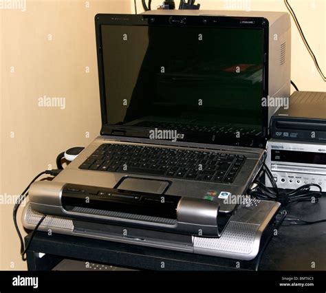 HP Laptop Computer on Docking Station Stock Photo - Alamy