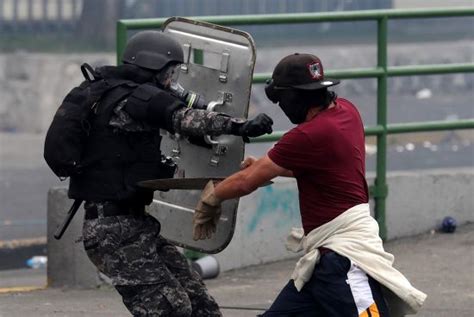 Demonstrator Confronts Policeman During Protests Indigenous Editorial