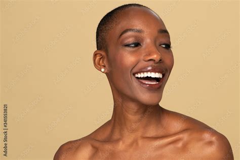 Happy Nude Black Woman Against A Beige Background Stock Photo Adobe Stock