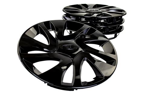 Купить колпаки на колеса R14 от Гранта с шильдиком черные глянцевые