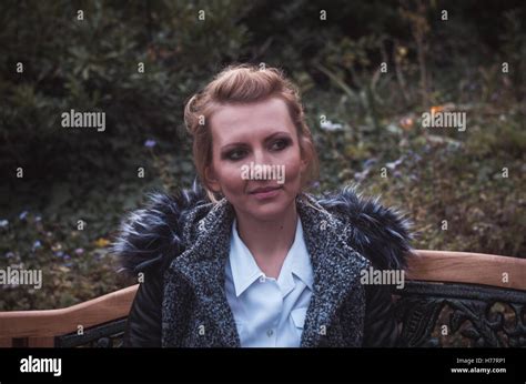 Blonde Woman Portrait In The Park Stock Photo Alamy