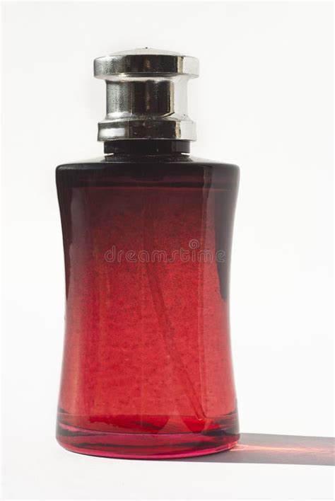 Perfume in red bottle stock photo. Image of aroma, feminine - 25338194