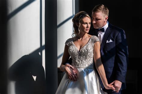 Couple Portrait Against Angled Shadows On Wall Photo By Amber Henry