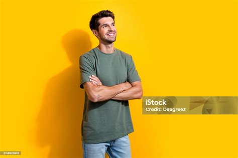 Photo Of Dreamy Confident Man With Bristle Dressed Khaki Tshirt Arms