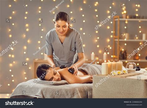 Woman Getting Hot Stones Massage Massage Stock Photo 2298684293 Shutterstock