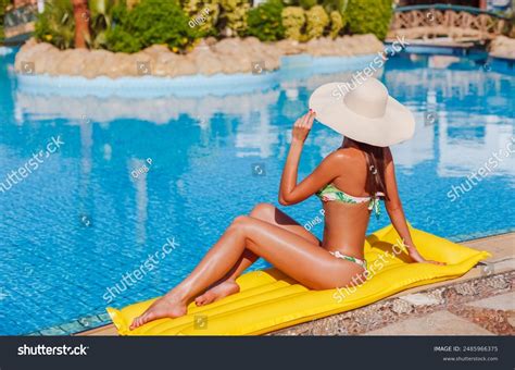 Sexy Tanned Model Woman Bikini Relaxing Stock Photo