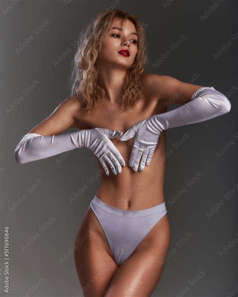 A Beautiful Half Naked Woman Covering Chest With Long White Gloved Hands Topless Sexy Blonde