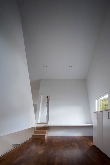 House In Japan By Spray Shelters Patios Beneath Its Wonky Roof