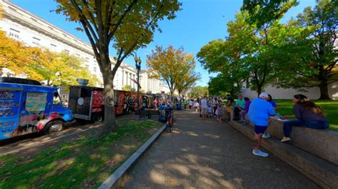 People Sitting By Food Trucks In Washington Dc Usa Stock Footage