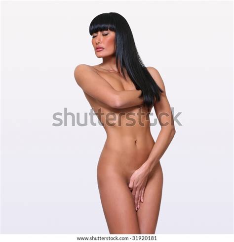 Beautiful Naked Woman Poses Covering Itself Stock Photo