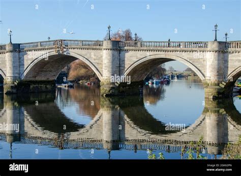 The Arches Of Richmond Bridge Reflected In The River Thames Richmond