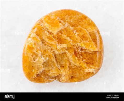 Macro Shooting Of Natural Mineral Rock Specimen Polished Clinohumite