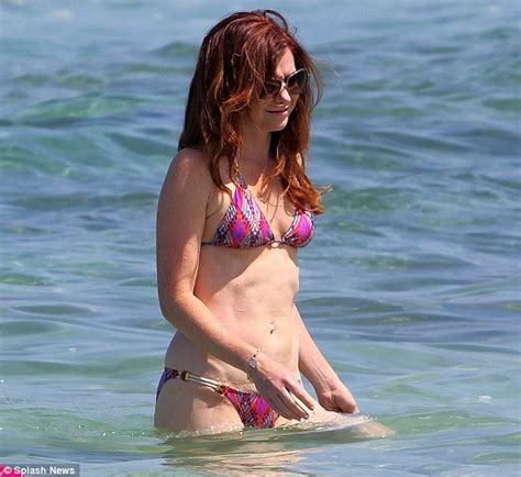 Alyson Hannigan Shows Off Her Incredible Bikini Body As She Splashes