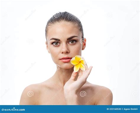 Nude Woman With Yellow Flower Near Face On Light Background Cropped View Stock Photo Image Of