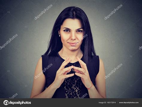 sly scheming woman plotting  stock photo  csiphotography