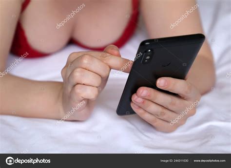 Sexy Woman Lingerie Lying Bed Using Smartphone Mobile Phone Female Stock Photo Olegpmr