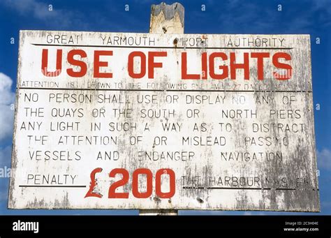 Great Yarmouth Port Authority use of lights warning sign Stock Photo