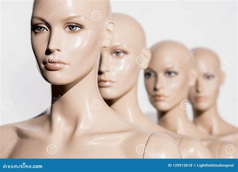 Close Up View Of Naked Bald Mannequins In Row On White Stock Photo Image Of Shot Plastic