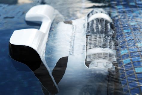 Dolphin robotic Pool Cleaner - Waterline Cleaning | Robotic pool ...