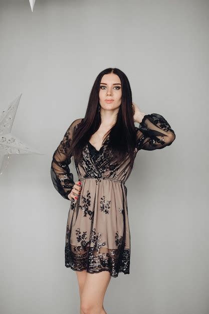 Premium Photo Gorgeous Brunette Model In Black Dress And Heels