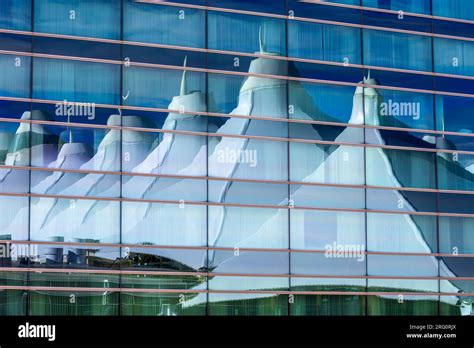 Denver International Airport Architecture Peaks Against Blue Sky