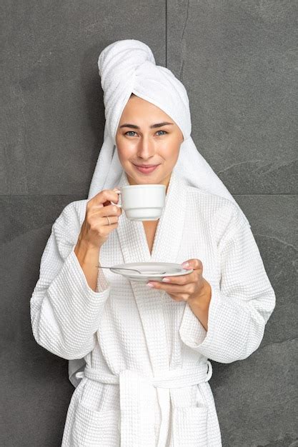 Premium Photo Dreamy Lady Enjoying Hot Beverage After Taking Bath