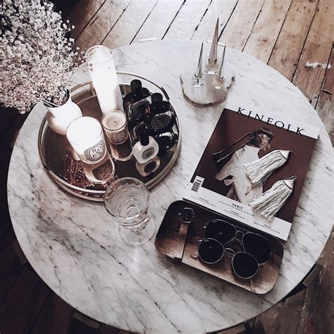 Marble Table Decor With Glasses And Magazines