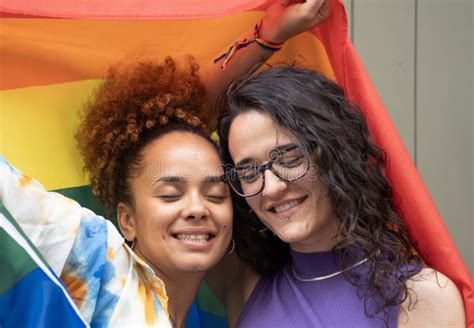 Headshot Of Lesbian Multicultural Couple Calm With Closed Eyes Enjoying The Moment Together