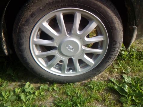 Брелок и колпочки на колеса — Lada Гранта (1G), 1,6 л, 2014 года ...