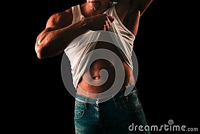 Naked Man Handsome Shirtless Muscular Man Standing In Studio Isolated On Black Royalty Free