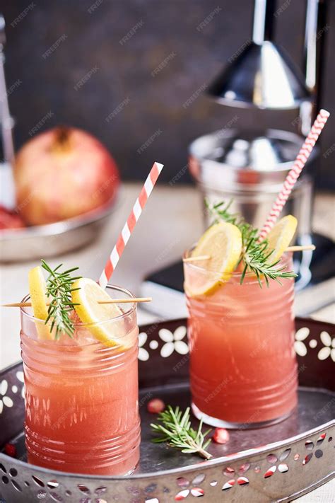 Premium Photo Vodka Cocktails With Pomegranate And Rosemary