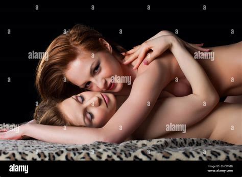 Two Topless Playful Naked Lesbian Woman In Bed Sexy Couple Stock Photo Alamy